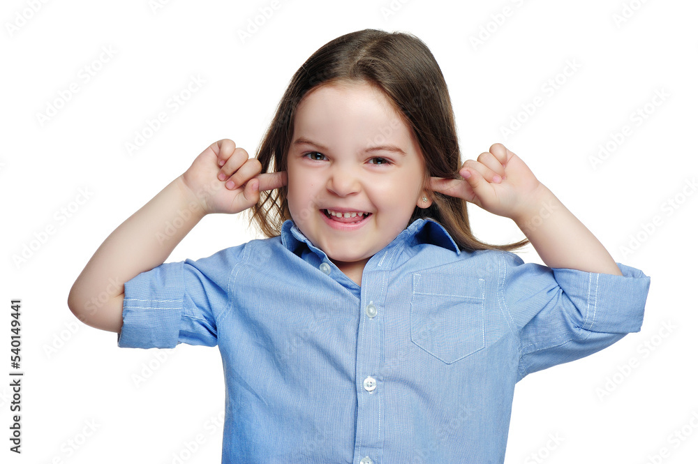 Laughing little girl closing ears with fingers Laughing little girl closing ears with fingers