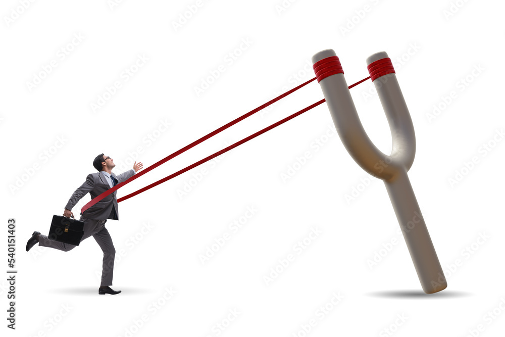 Businessman being launched from slingshot in career concept