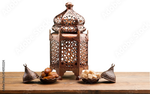 Arabic lantern and plate with date fruits