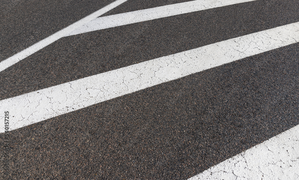 Paved highway with white road markings Paved highway with white road markings