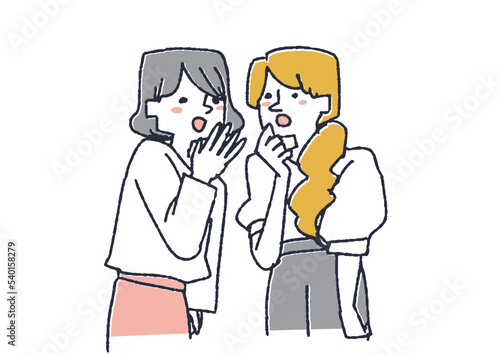 女性二人が固まって噂話をしている様子