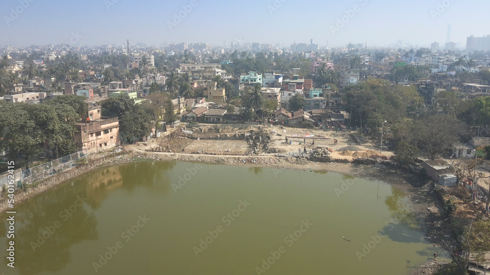 View from top, Bejpukur, the big pond of Howrah city, West Bengal, India. Howrah is a 500 year old city, older than Kolkata which is 300 years old city.