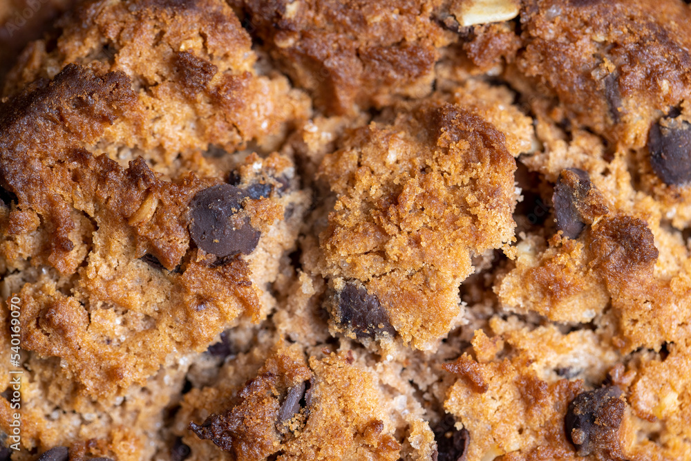 Delicious cookies with pieces of chocolate on the table Delicious cookies with pieces of chocolate on the table