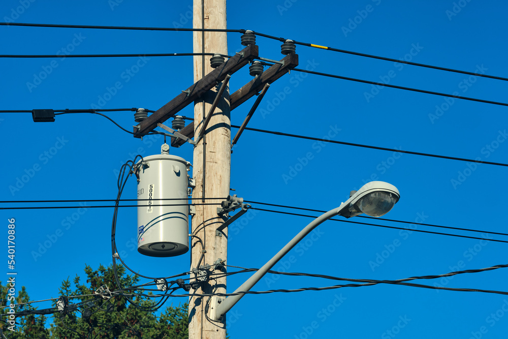 Street light and electrical pole with a transformer Street light and electrical pole with a transformer