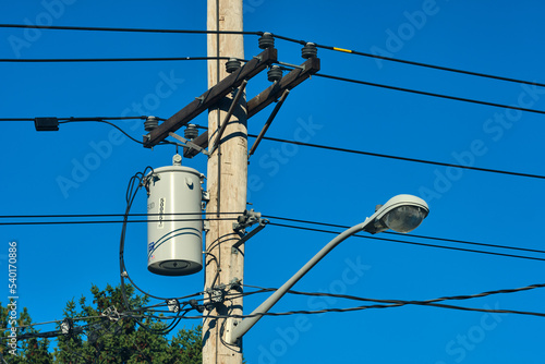 Street light and electrical pole with a transformer