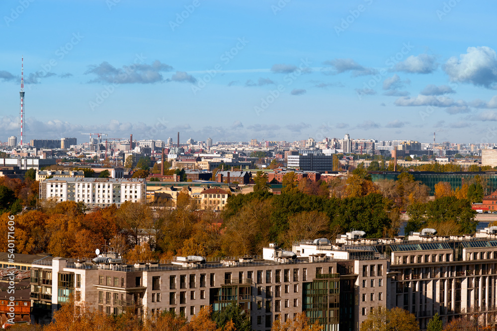 Beautiful top view of a large European city during the day in clear weather in autumn.