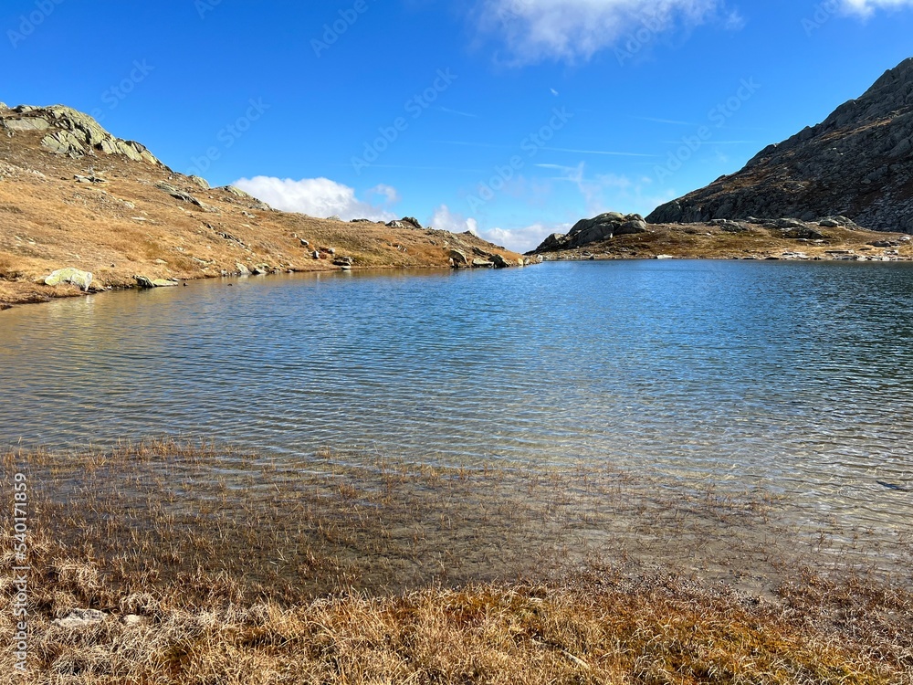 Fototapeta premium Early autumn on the alpine lakes Laghi della Valletta in the mountainous area of the St. Gotthard Pass (Gotthardpass), Airolo - Canton of Ticino (Tessin), Switzerland (Schweiz)
