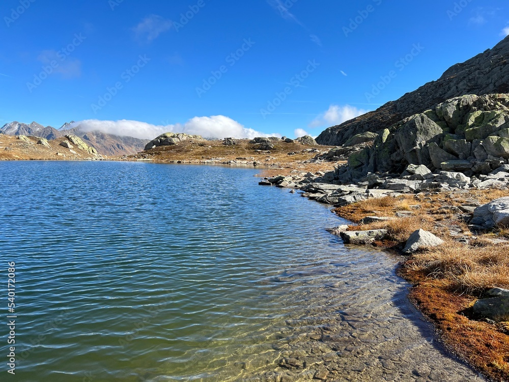 Early autumn on the alpine lakes Laghi della Valletta in the mountainous area of the St. Gotthard Pass (Gotthardpass), Airolo - Canton of Ticino (Tessin), Switzerland (Schweiz) Early autumn on the alpine lakes Laghi della Valletta in the mountainous area of the St. Gotthard Pass (Gotthardpass), Airolo - Canton of Ticino (Tessin), Switzerland (Schweiz)