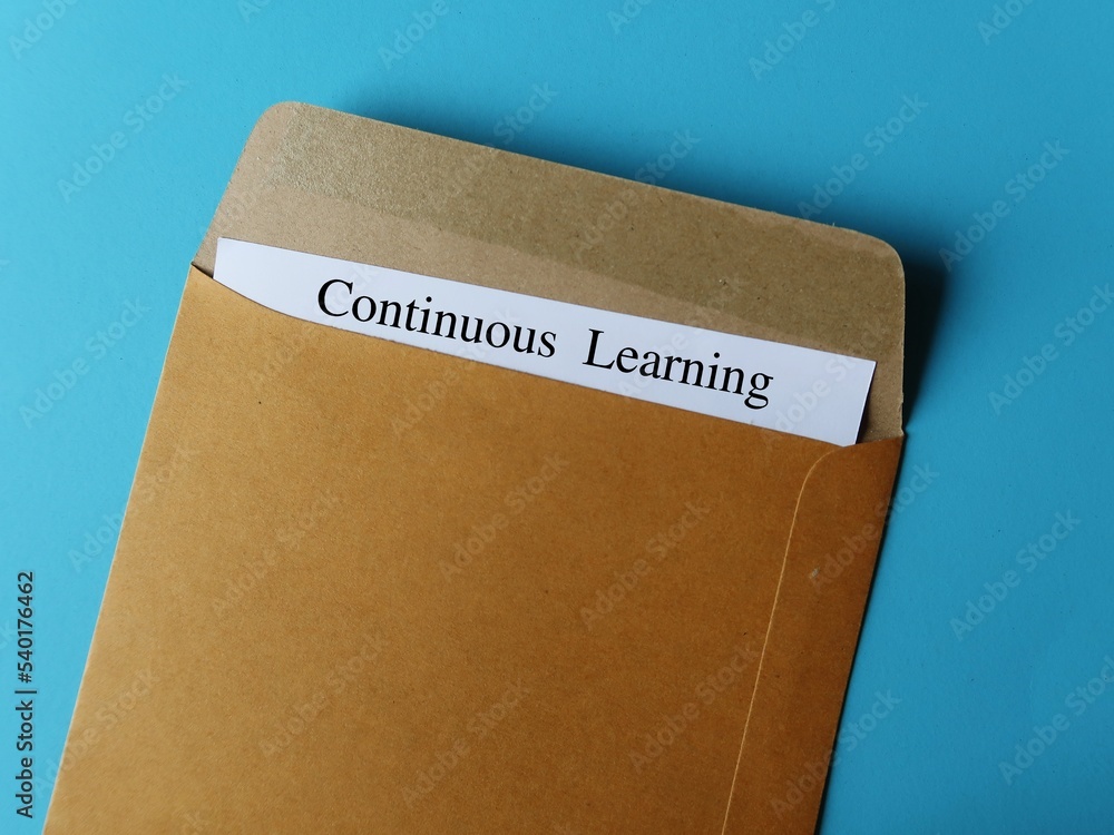 On blue background, office document in envelope written Continuous ...