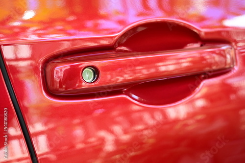 door handle of red car, transpotation industry