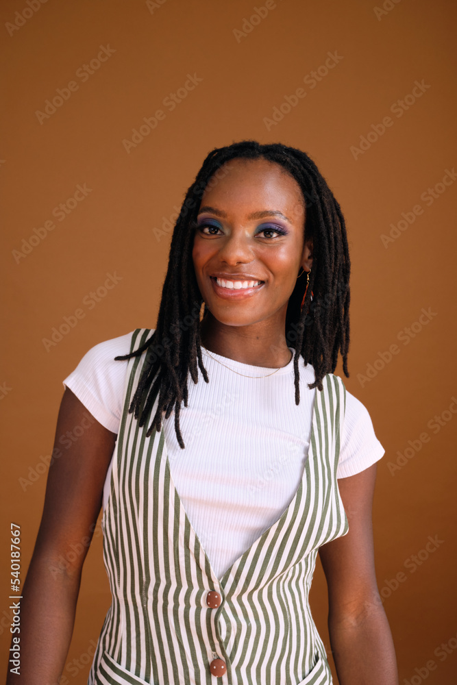 Studio portrait of young beautiful woman with dreads Studio portrait of young beautiful woman with dreads
