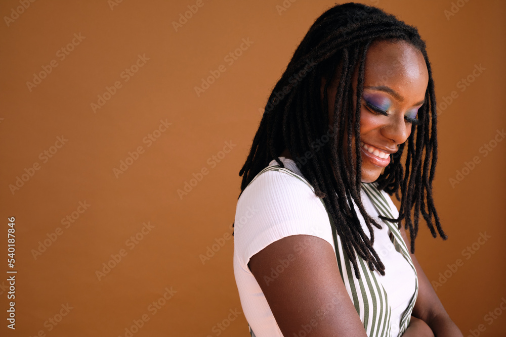 Studio portrait of young beautiful woman with dreads Studio portrait of young beautiful woman with dreads