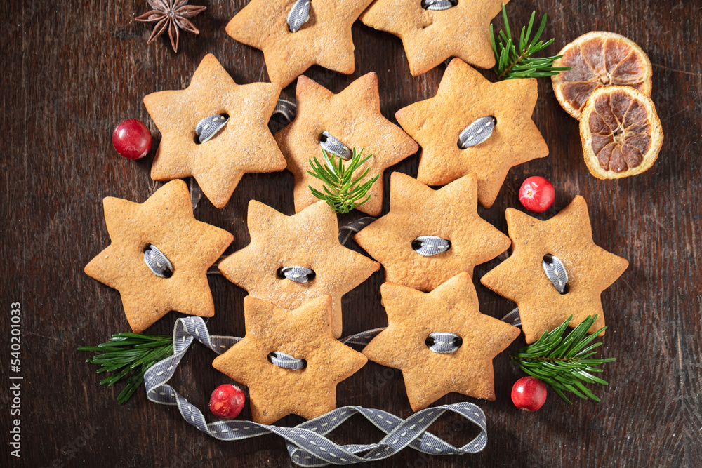 Top down view of Gingerbread cookies chain as Christmas decoration. Top down view of Gingerbread cookies chain as Christmas decoration.
