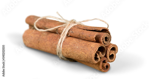 Dry cinnamon sticks isolated on white background
