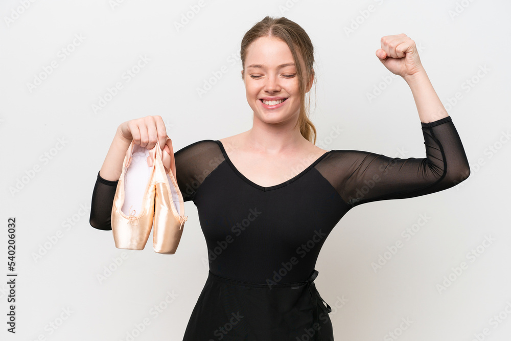 Young woman practicing ballet isolated on white background doing strong gesture Young woman practicing ballet isolated on white background doing strong gesture