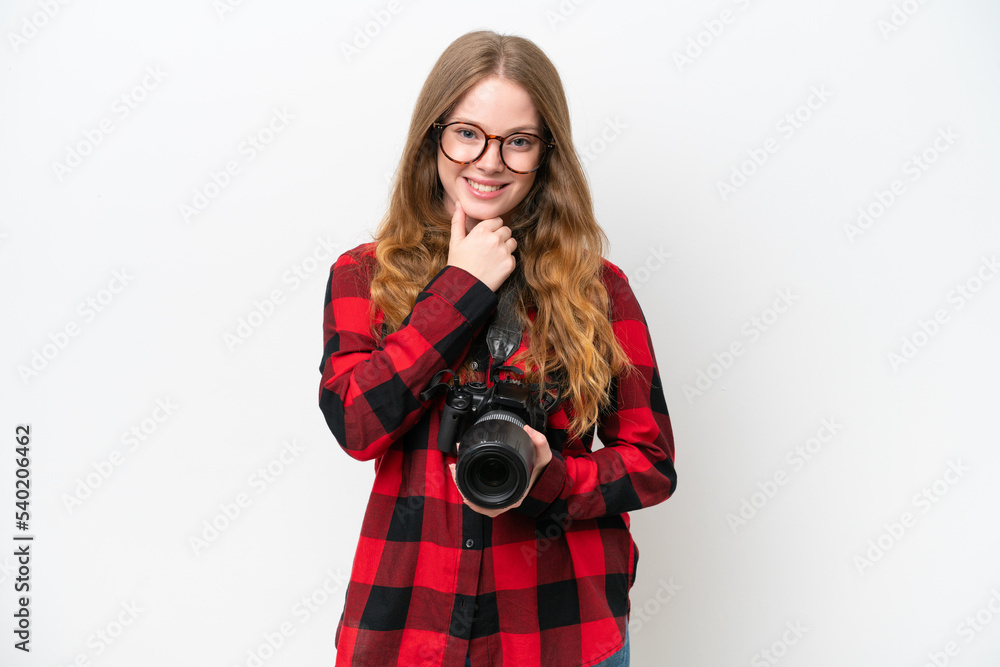 Obraz premium Young photographer pretty woman isolated on white background with glasses and smiling