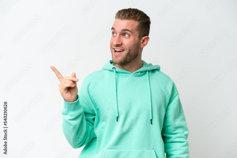 Young handsome caucasian man isolated on white background intending to realizes the solution while lifting a finger up Young handsome caucasian man isolated on white background intending to realizes the solution while lifting a finger up