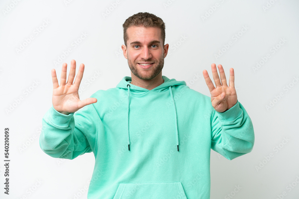 Young handsome caucasian man isolated on white background counting nine with fingers Young handsome caucasian man isolated on white background counting nine with fingers