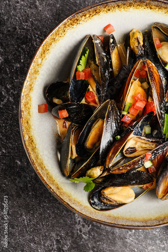 mussels with shells in tomato sauce