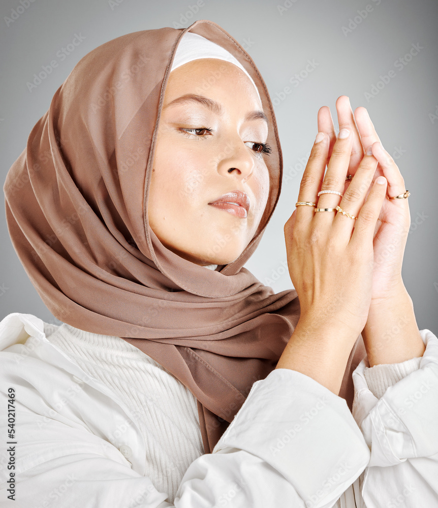 Hijab, jewelry and fashion of woman in islam beauty headshot with makeup or cosmetics in a studio mock up. Arab, muslim or arabic model wearing scarf fabric and ring on hands with mockup background Hijab, jewelry and fashion of woman in islam beauty headshot with makeup or cosmetics in a studio mock up. Arab, muslim or arabic model wearing scarf fabric and ring on hands with mockup background