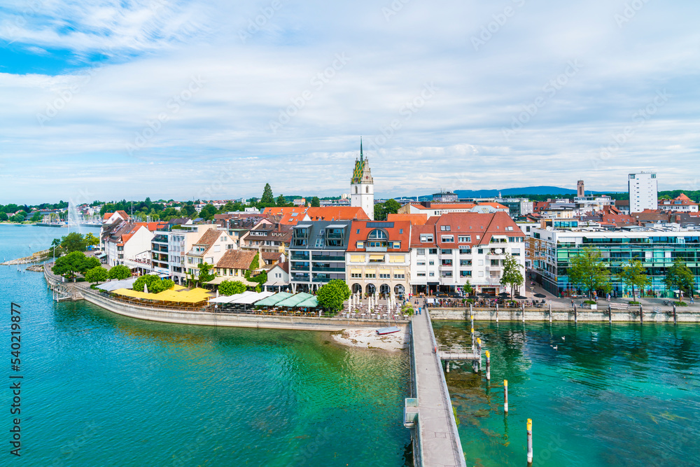 Germany, Friedrichshafen city coast of bodensee lake houses promenade lakeside in summer, aerial panorama view above buildings