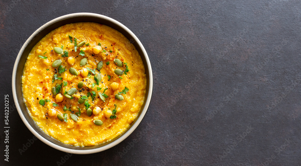 Pumpkin hummus with seeds and greens. Healthy eating. Vegetarian food.