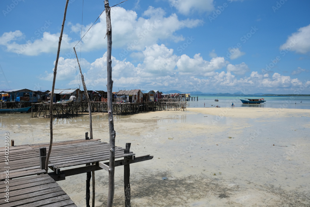 Omadal Island is a Malaysian island located in the Celebes Sea on the state of Sabah. The bajau laut village community during low tide time.