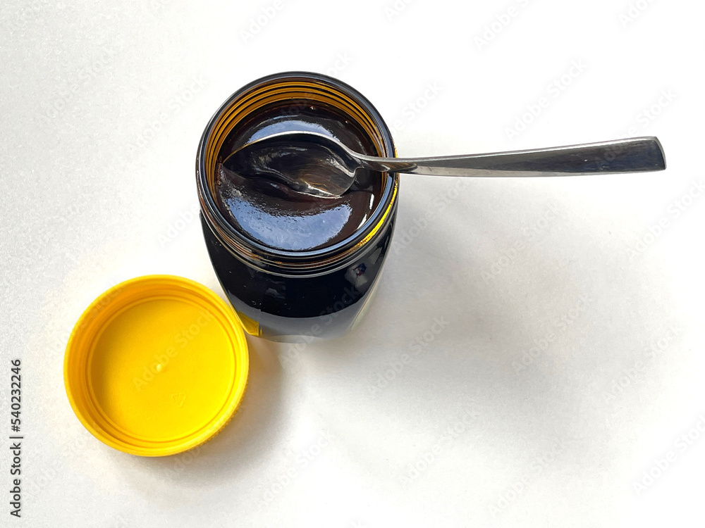 Newly opened yeast extract marmite jar from above Newly opened yeast extract marmite jar from above