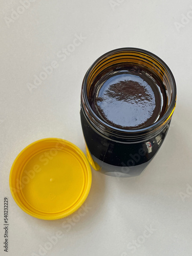 Newly opened yeast extract marmite jar from above photo
