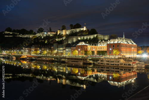 night view of namur from the riverside of river meuse.