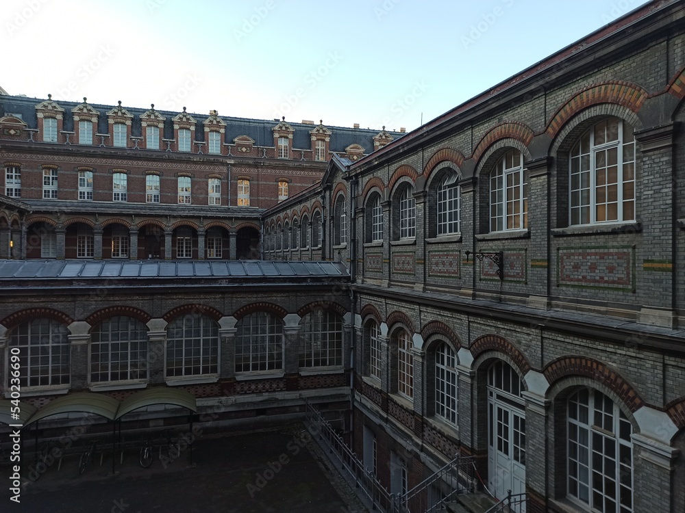 Lille, September 2022: Magnificent facades of the buildings of Lille, the capital of Flanders - Former industrial building housing the ENSAM school	