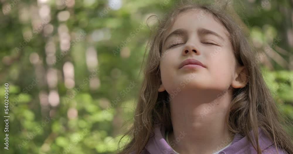 Portrait Child Girl Exhaling Fresh Air, Taking Deep Breath, Reducing Stress in Forest. Dreamy Peaceful Relaxed Smiling Teenager Girl Breathing Fresh Air Nature, Tranquil Caucasian Child Alone Outdoors Portrait Child Girl Exhaling Fresh Air, Taking Deep Breath, Reducing Stress in Forest. Dreamy Peaceful Relaxed Smiling Teenager Girl Breathing Fresh Air Nature, Tranquil Caucasian Child Alone Outdoors