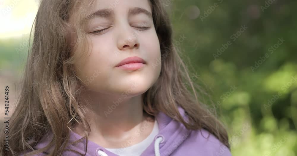 Portrait Child Girl Exhaling Fresh Air, Taking Deep Breath, Reducing Stress in Forest. Dreamy Peaceful Relaxed Smiling Teenager Girl Breathing Fresh Air Nature, Tranquil Caucasian Child Alone Outdoors Portrait Child Girl Exhaling Fresh Air, Taking Deep Breath, Reducing Stress in Forest. Dreamy Peaceful Relaxed Smiling Teenager Girl Breathing Fresh Air Nature, Tranquil Caucasian Child Alone Outdoors