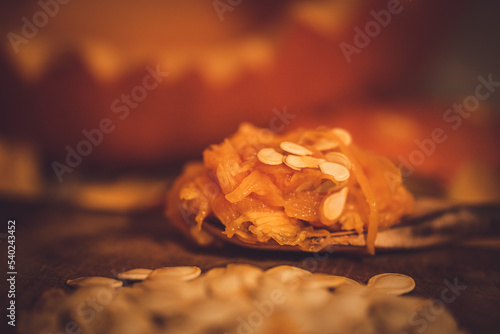 Close-up of pumpkin seeds on a scoop
