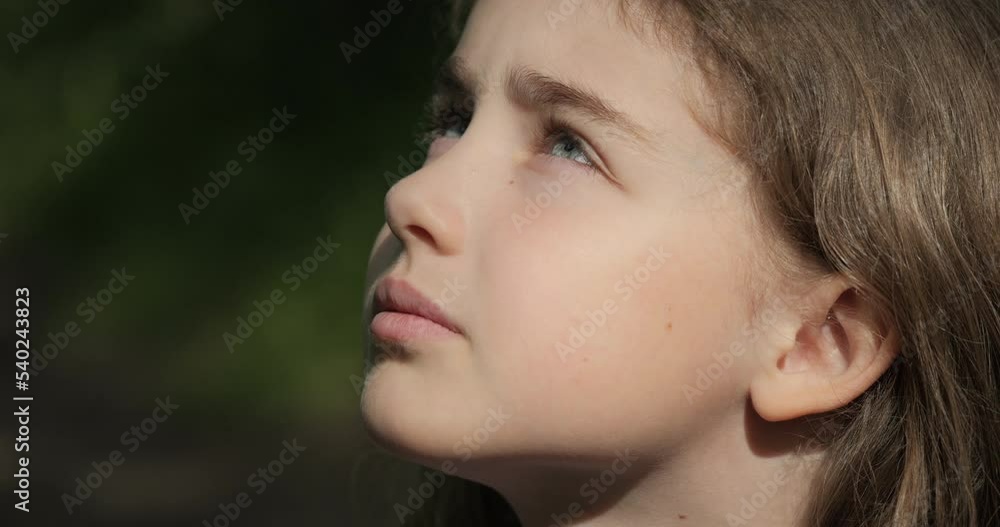 Child Looking Up at Sky in Nature. Portrait Teenager Girl Praying Looking Up at Sky With Hope and Faith, Contemplative Child Face, Closeup. Girl Looks-up God Believer Prayer, Passionate Dreamer Divine Child Looking Up at Sky in Nature. Portrait Teenager Girl Praying Looking Up at Sky With Hope and Faith, Contemplative Child Face, Closeup. Girl Looks-up God Believer Prayer, Passionate Dreamer Divine