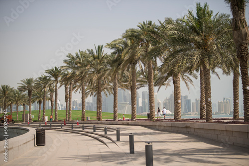 Doha,Qatar - March 05, 2019 : People enjoying a sunny day in the park of the Museum of Islamic Art in Doha. © A1