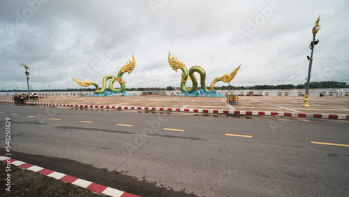 The Naga Statue in Nong Khai, Thailand. the landmark of the town at the mekong promenade. 