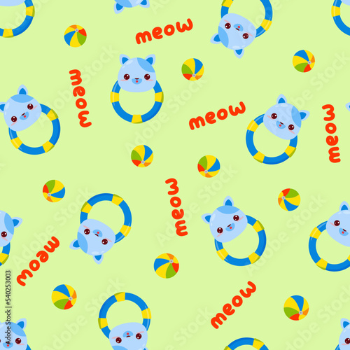 Seamless pattern with animals on a green background. A pattern with a baby rattle in the form of a cat. Kawaii animals.