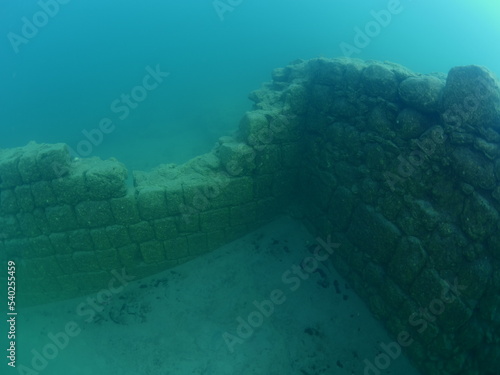 antic walls of urartian asurian castle underwater in lake van turkey photo