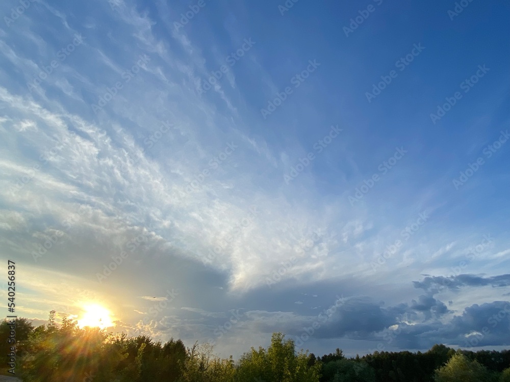 Summer blue sky with clouds. Beautiful blue sky.