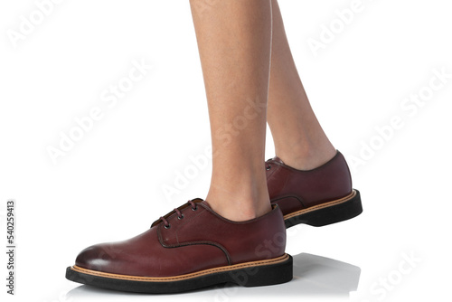 Men wearing leather shoes stepping pose of side view isolated on white background © kintarapong