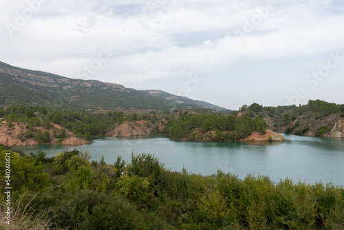 Beautiful image of the cortes del pallas reservoir with the mountain cuts and its grove everywhere in the Valencian community  Spain