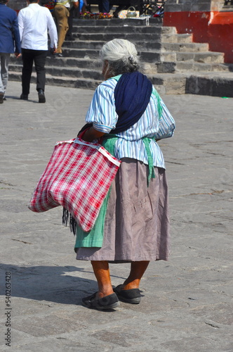 Old lady walking in Mexico © Diana