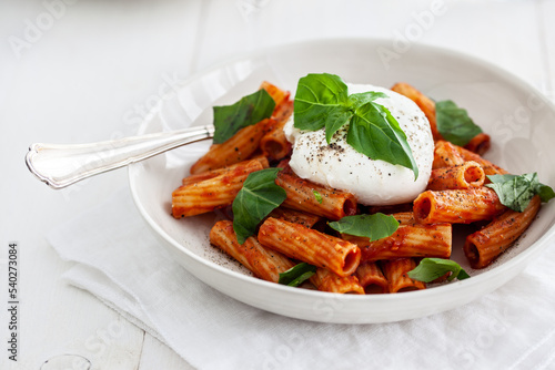 Pasta with tomato sauce and burrata