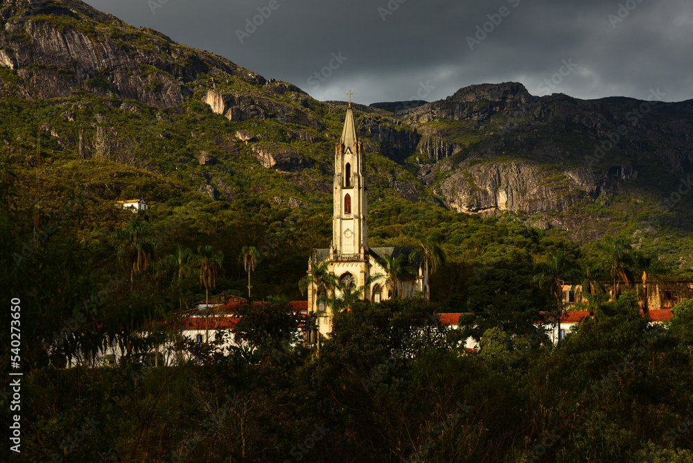 The Santuário do Caraça church surrounded by the rugged Serra do Caraça mountain range, Catas Altas, Minas Gerais state, Brazil