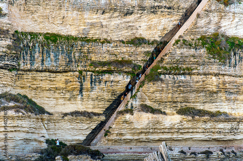 France. Corsica. Bonifacio. Tourists climbing the staircase of the King of Aragon