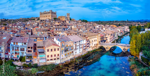 Valderrobres village with its bridge and castle at sunset in Teruel, Spain.