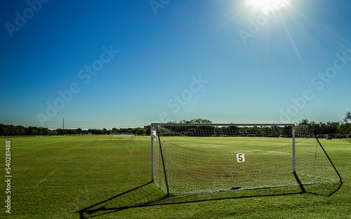 Noon day sun over a soccer field