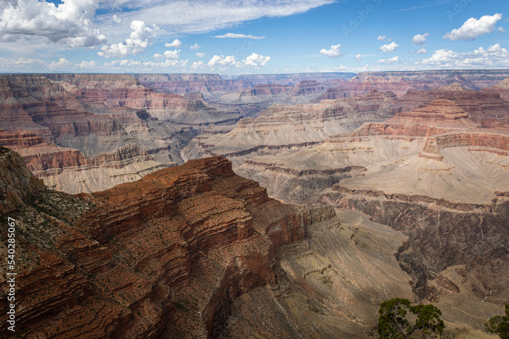 The Grand Canyon, a huge canyon carved out by erosion in red, yellow, brown and orange, where the Colorado River still flows at the bottom, photos taken from a helicopter, Arizona state, USA The Grand Canyon, a huge canyon carved out by erosion in red, yellow, brown and orange, where the Colorado River still flows at the bottom, photos taken from a helicopter, Arizona state, USA