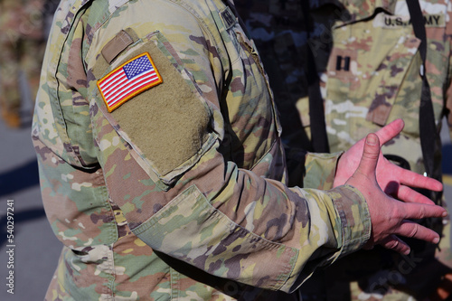 United States flag attached to the US army military uniform.